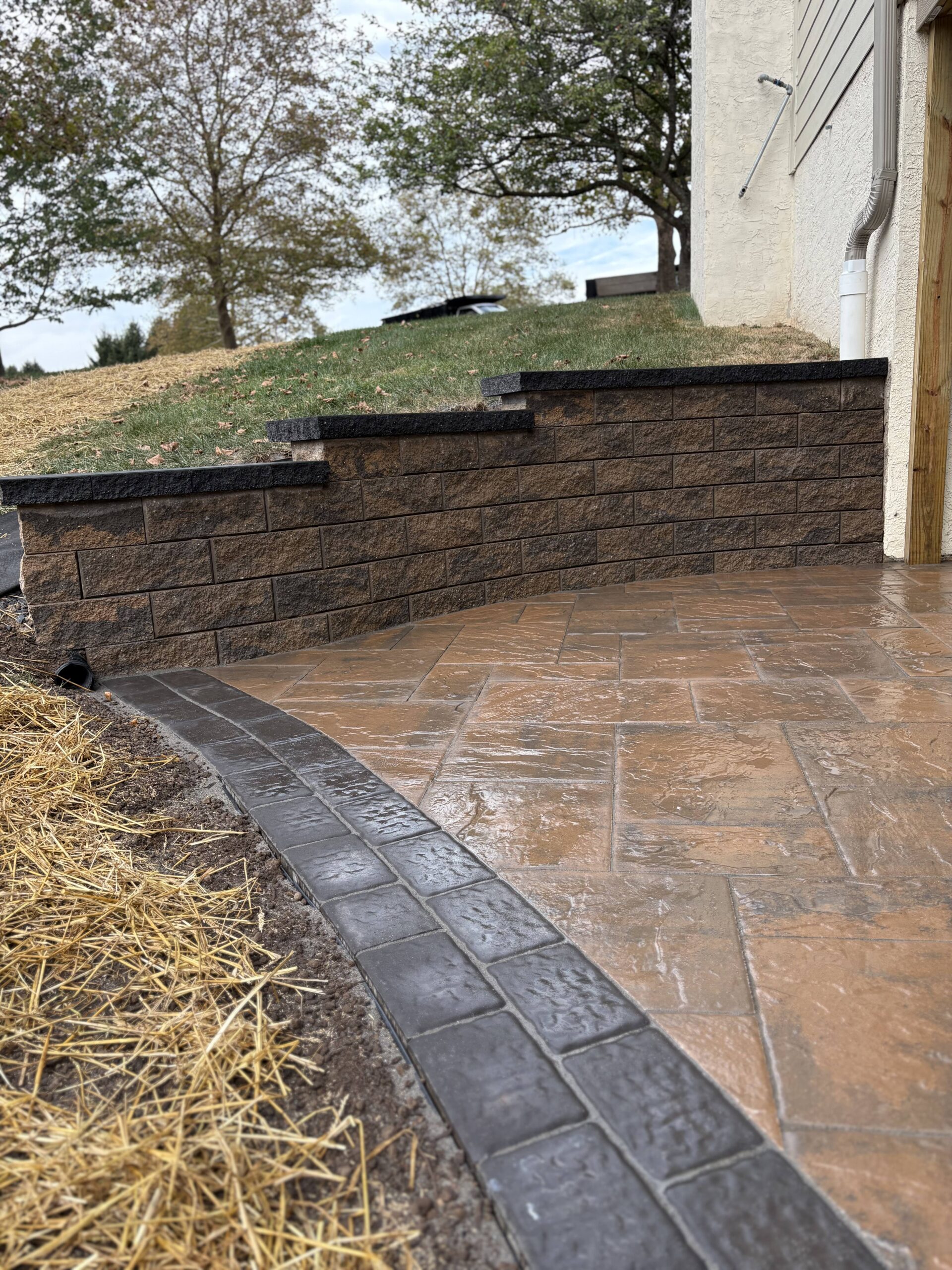 Learn expert hardscaping maintenance tips to keep patios, walkways & stones durable year-round — cleaning, sealing, weed control & more for long-lasting results.